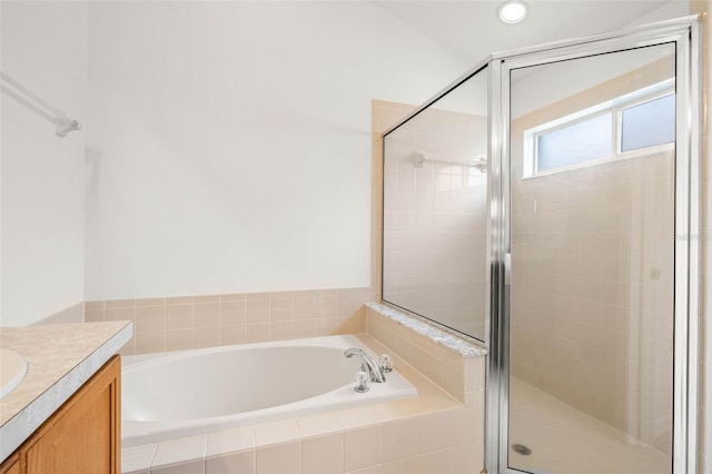 12746 Standbridge Dr, Riverview, FL 33579 - bathroom with a garden tub, a shower stall, vanity, and recessed lighting