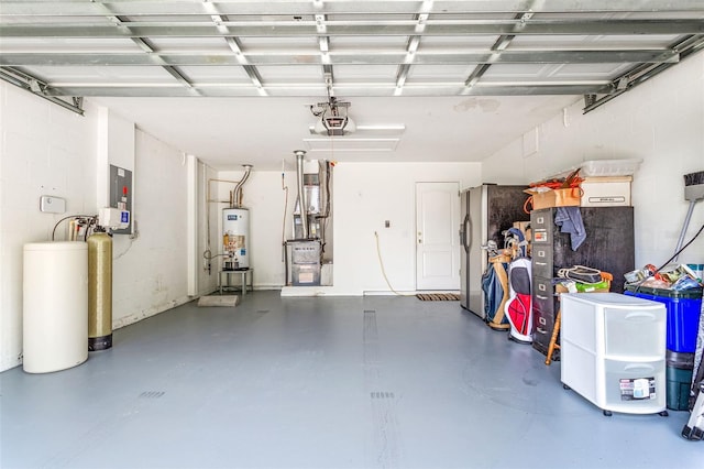 12746 Standbridge Dr, Riverview, FL 33579 - garage with gas water heater, heating unit, electric panel, and freestanding refrigerator