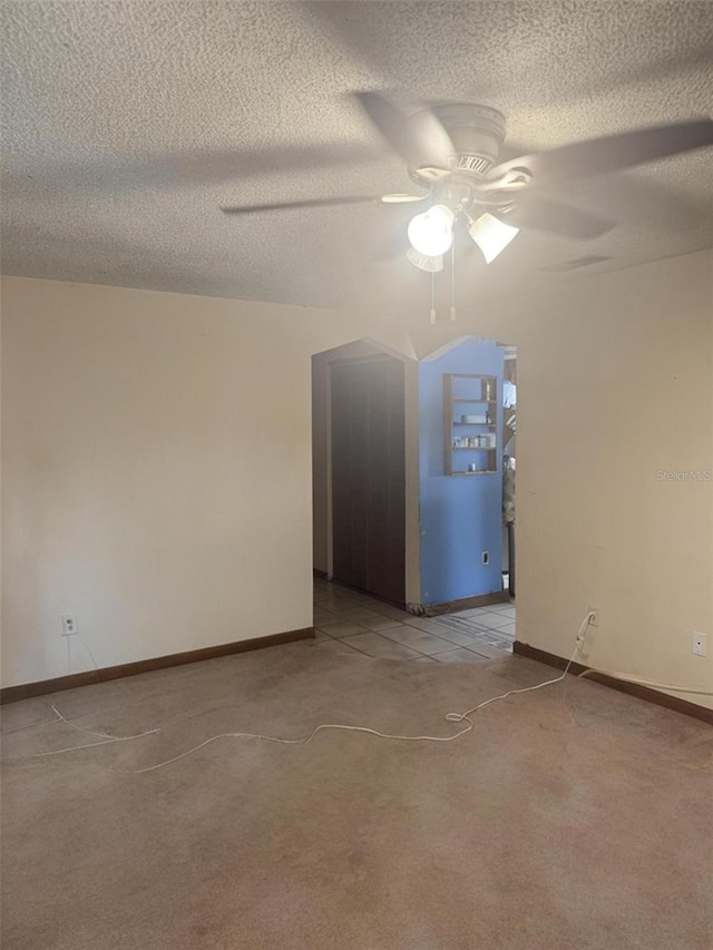 2220 Woods Trl, Lakeland, FL 33809 - unfurnished room with ceiling fan, a textured ceiling, carpet flooring, and baseboards