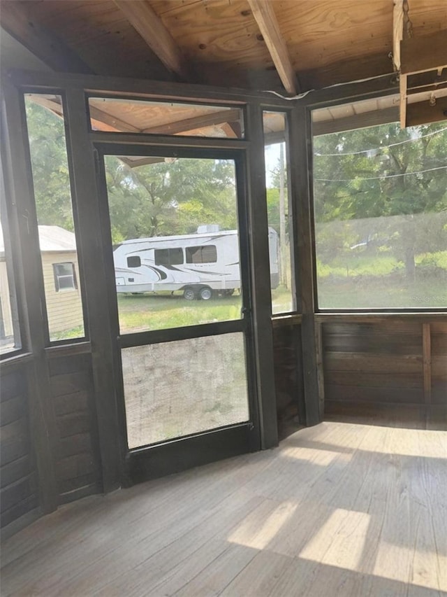 2220 Woods Trl, Lakeland, FL 33809 - unfurnished sunroom featuring beam ceiling