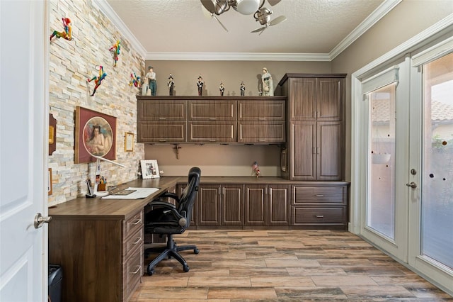 12672 Fontana Loop, Bradenton, FL 34211 - office space with light wood finished floors, crown molding, a textured ceiling, and built in desk