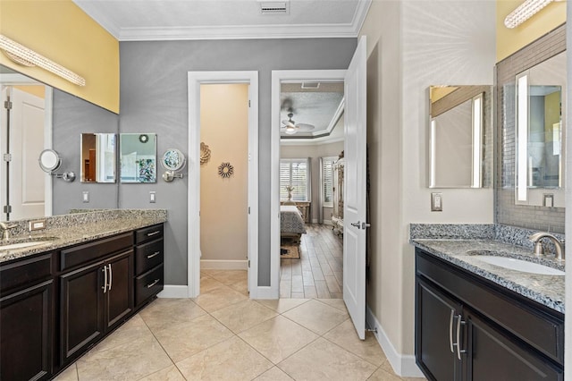 12672 Fontana Loop, Bradenton, FL 34211 - bathroom with ornamental molding, connected bathroom, two vanities, a ceiling fan, and baseboards