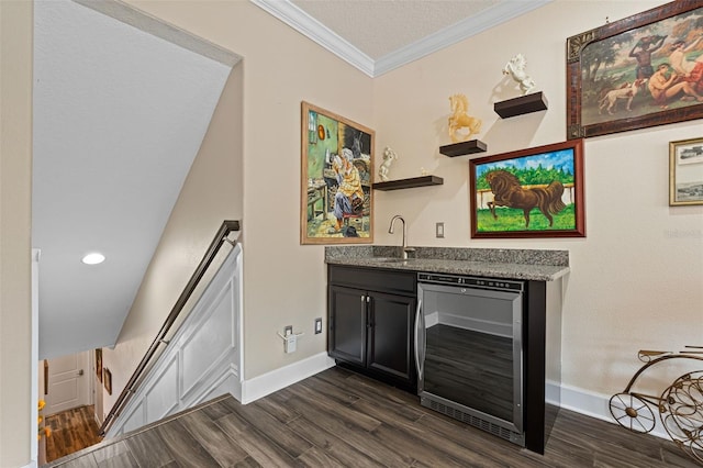 12672 Fontana Loop, Bradenton, FL 34211 - indoor wet bar featuring wine cooler, dark wood-style flooring, ornamental molding, and baseboards