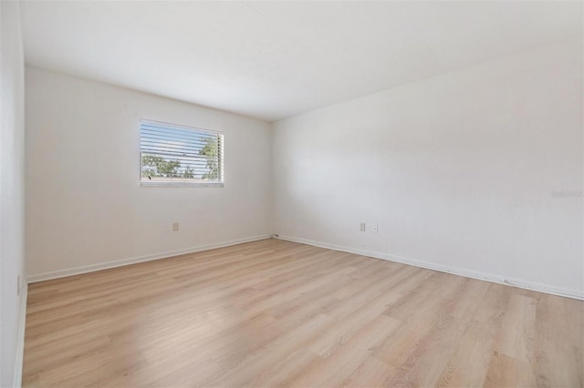 1485 Lakeview Rd Unit 19, Clearwater, FL 33756 - unfurnished room featuring light wood-style flooring and baseboards