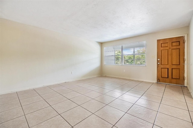 1485 Lakeview Rd Unit 19, Clearwater, FL 33756 - foyer featuring light tile patterned flooring and baseboards