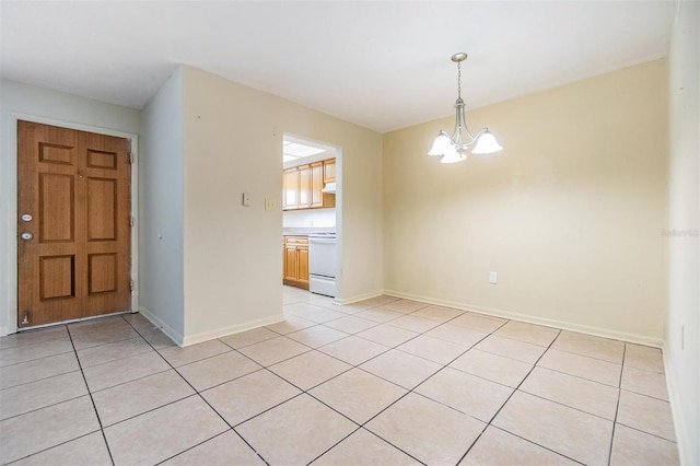 1485 Lakeview Rd Unit 19, Clearwater, FL 33756 - entryway with a chandelier, light tile patterned flooring, and baseboards