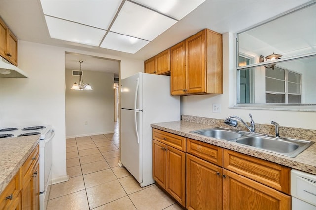 1485 Lakeview Rd Unit 19, Clearwater, FL 33756 - kitchen featuring white appliances, a sink, light tile patterned floors, and light countertops