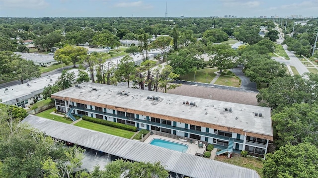 1485 Lakeview Rd Unit 19, Clearwater, FL 33756 - bird's eye view of a pool and a tree filled landscape