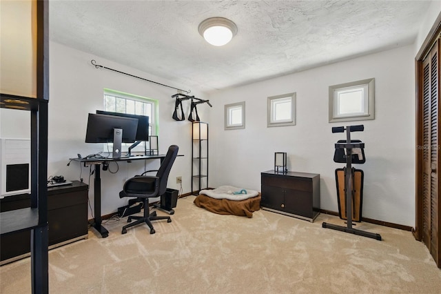 11285 8th St E, Treasure Island, FL 33706 - office space featuring carpet flooring, baseboards, and a textured ceiling