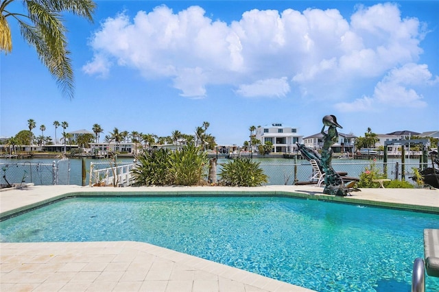 11285 8th St E, Treasure Island, FL 33706 - view of swimming pool with a water view, a patio area, and a residential view