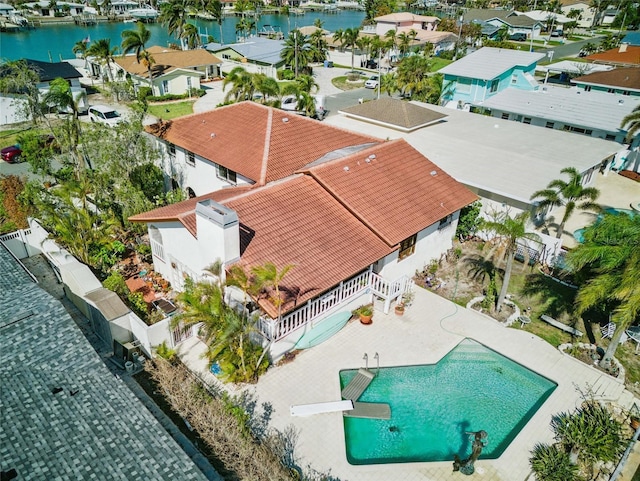 11285 8th St E, Treasure Island, FL 33706 - aerial view of residential area featuring a large body of water and a pool