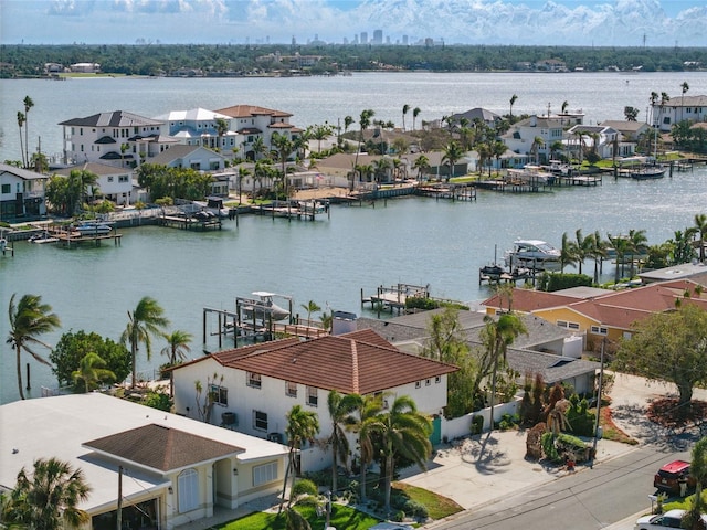11285 8th St E, Treasure Island, FL 33706 - aerial view of residential area featuring a large body of water