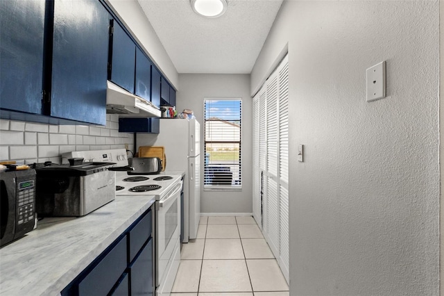 7124 Barclay Ave Unit A, Spring Hill, FL 34609 - kitchen featuring under cabinet range hood, blue cabinetry, white range with electric cooktop, black microwave, and decorative backsplash
