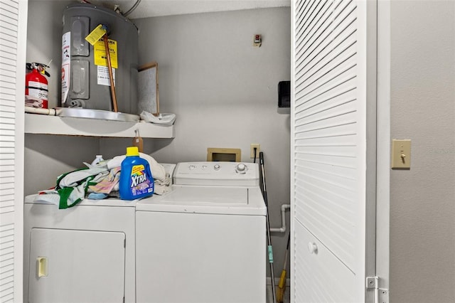 7124 Barclay Ave Unit A, Spring Hill, FL 34609 - washroom featuring electric water heater and independent washer and dryer