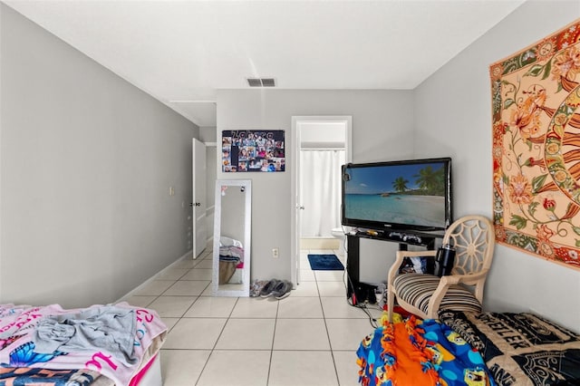7124 Barclay Ave Unit A, Spring Hill, FL 34609 - bedroom with light tile patterned floors
