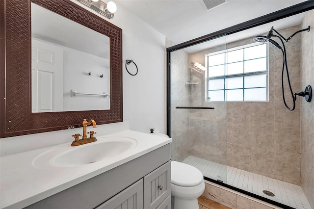 3865 Gatewood Dr, Sarasota, FL 34232 - full bath featuring a stall shower, vanity, and toilet