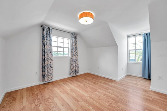 3865 Gatewood Dr, Sarasota, FL 34232 - bonus room with light wood-style floors, plenty of natural light, vaulted ceiling, and baseboards