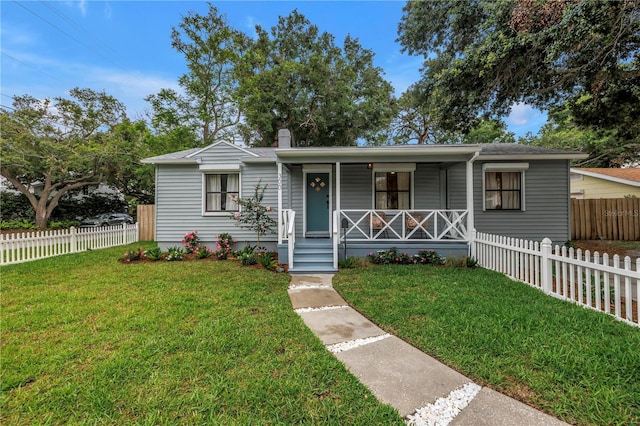 300 33rd Ave N, Saint Petersburg, FL 33704 - view of front facade with a porch