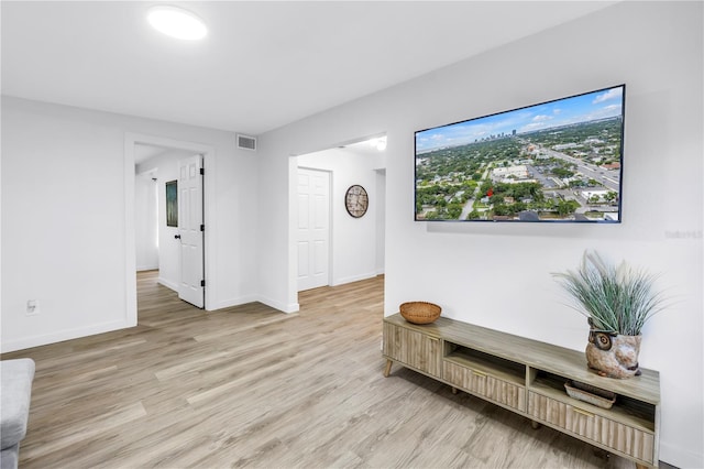 300 33rd Ave N, Saint Petersburg, FL 33704 - hallway featuring wood finished floors and baseboards