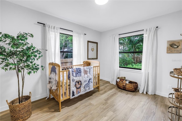 300 33rd Ave N, Saint Petersburg, FL 33704 - living area featuring light wood finished floors and baseboards