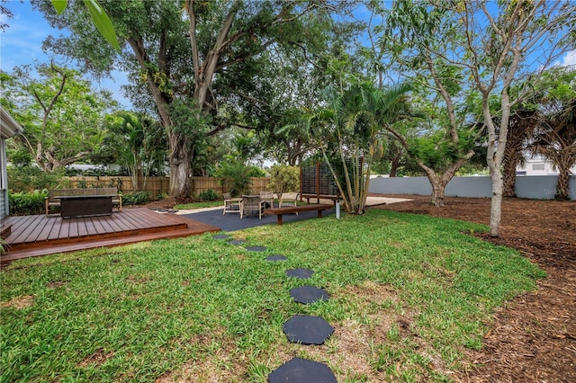 300 33rd Ave N, Saint Petersburg, FL 33704 - view of yard featuring a wooden deck