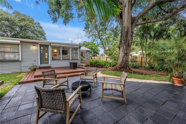 300 33rd Ave N, Saint Petersburg, FL 33704 - view of patio with a deck and an outdoor fire pit