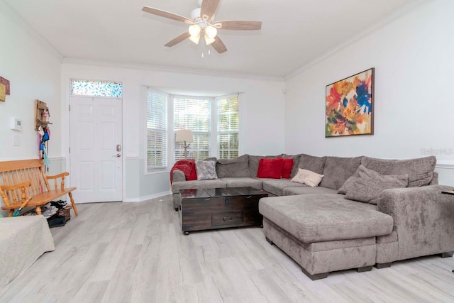 2648 Sabal Springs Dr Unit 2, Clearwater, FL 33761 - living area featuring ceiling fan, wood finished floors, and crown molding
