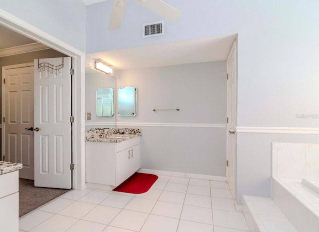 2648 Sabal Springs Dr Unit 2, Clearwater, FL 33761 - bathroom with vanity, a tub, ceiling fan, and tile patterned floors
