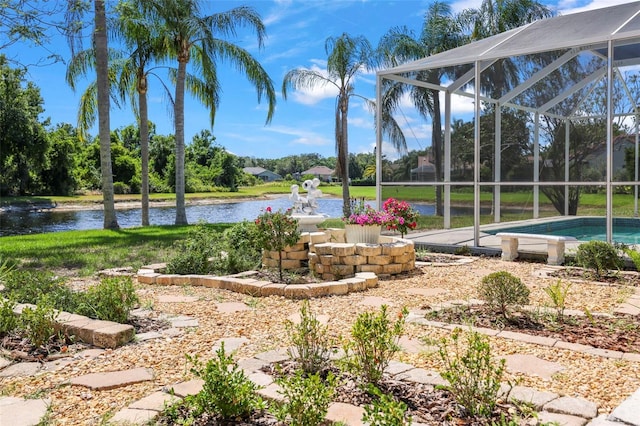 5160 Loquat Ct, Palm Harbor, FL 34685 - view of yard with a water view, an outdoor pool, and a lanai