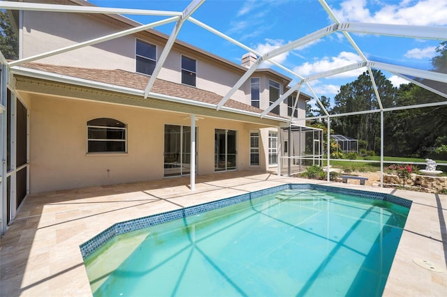 5160 Loquat Ct, Palm Harbor, FL 34685 - swimming pool featuring a patio area and glass enclosure
