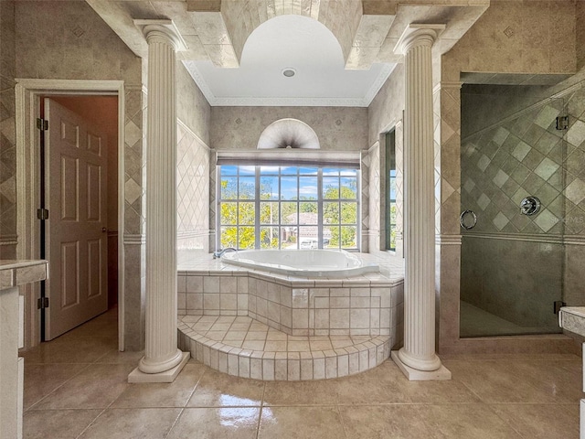 5160 Loquat Ct, Palm Harbor, FL 34685 - bathroom featuring decorative columns, ornamental molding, a bath, and a stall shower