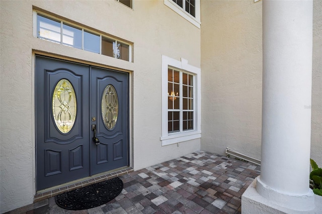 5160 Loquat Ct, Palm Harbor, FL 34685 - doorway to property with stucco siding
