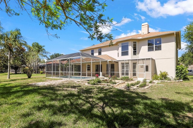 5160 Loquat Ct, Palm Harbor, FL 34685 - back of house with stucco siding, a lawn, a chimney, and a lanai