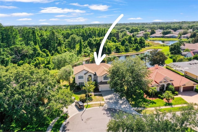 5160 Loquat Ct, Palm Harbor, FL 34685 - aerial perspective of suburban area with a nearby body of water and a forest