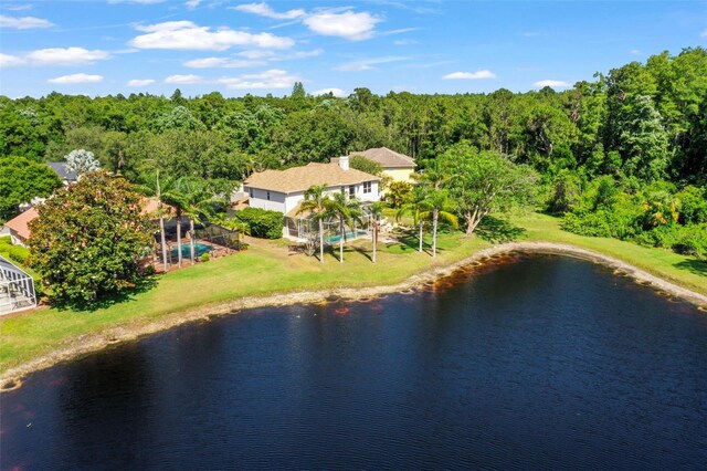 5160 Loquat Ct, Palm Harbor, FL 34685 - view of subject property with a forest and a nearby body of water