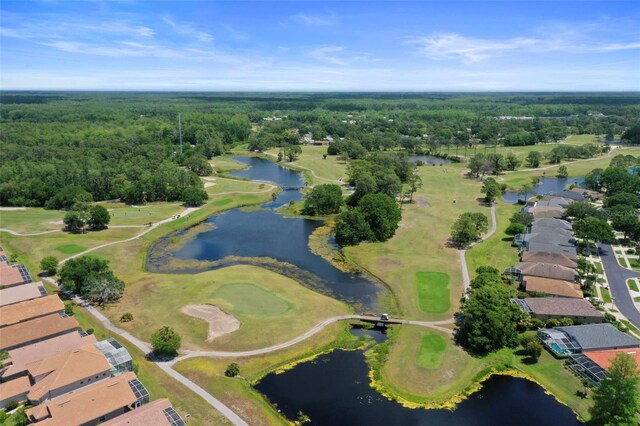 5160 Loquat Ct, Palm Harbor, FL 34685 - aerial view of property's location with a nearby body of water, a local golf course, a heavily wooded area, and nearby suburban area