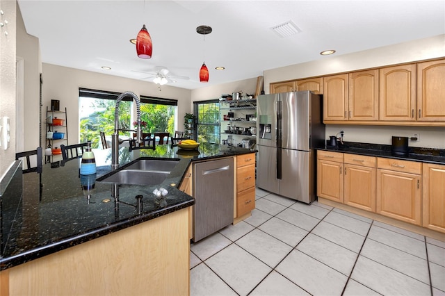 405 8th Ave N, Tierra Verde, FL 33715 - kitchen with stainless steel appliances, a sink, ceiling fan, decorative light fixtures, and light tile patterned floors