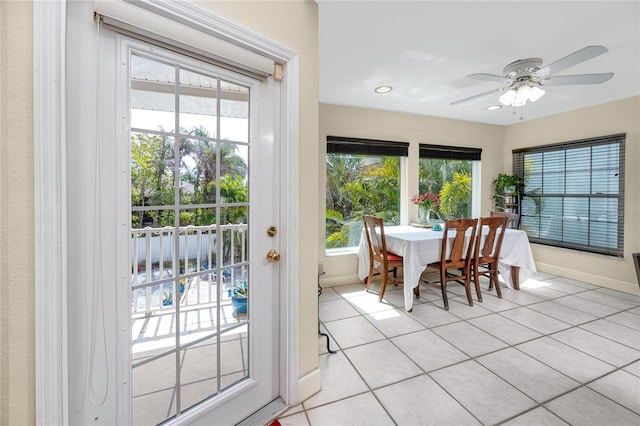 405 8th Ave N, Tierra Verde, FL 33715 - dining room with light tile patterned flooring, ceiling fan, baseboards, and recessed lighting