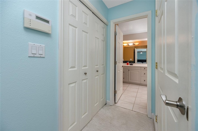 405 8th Ave N, Tierra Verde, FL 33715 - corridor with light tile patterned floors