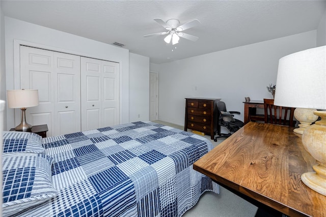 405 8th Ave N, Tierra Verde, FL 33715 - bedroom with a closet, a ceiling fan, and carpet flooring