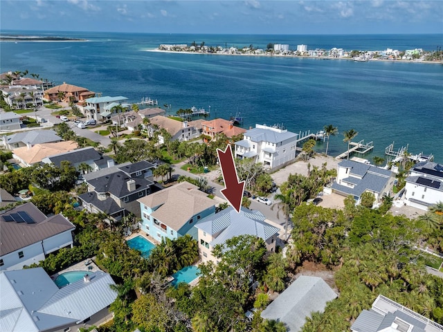 405 8th Ave N, Tierra Verde, FL 33715 - aerial perspective of suburban area featuring a large body of water