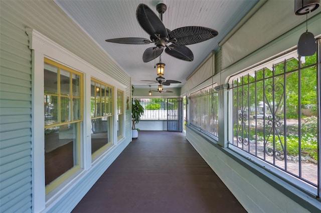 1825 2nd St S, Saint Petersburg, FL 33705 - unfurnished sunroom featuring ceiling fan