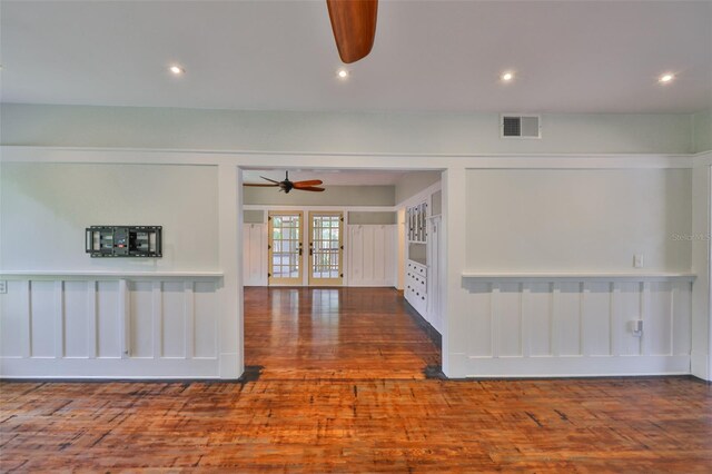 1825 2nd St S, Saint Petersburg, FL 33705 - unfurnished living room with ceiling fan, wood finished floors, french doors, and recessed lighting