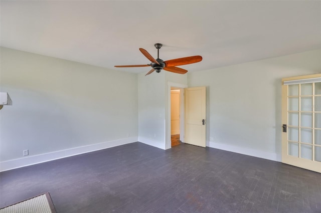 1825 2nd St S, Saint Petersburg, FL 33705 - spare room featuring ceiling fan, baseboards, and dark wood finished floors