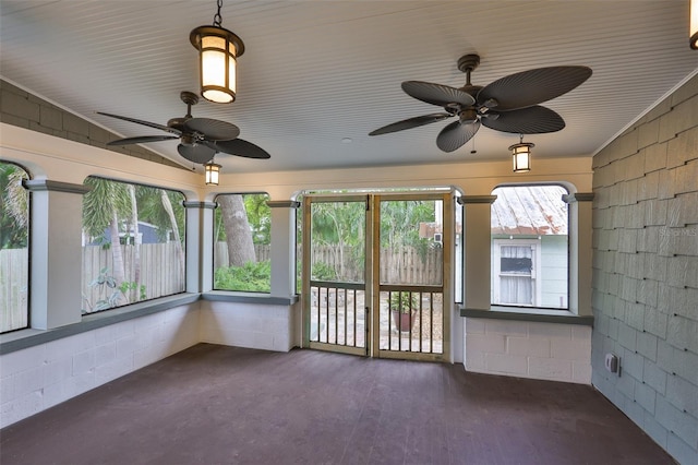 1825 2nd St S, Saint Petersburg, FL 33705 - unfurnished sunroom featuring concrete block wall