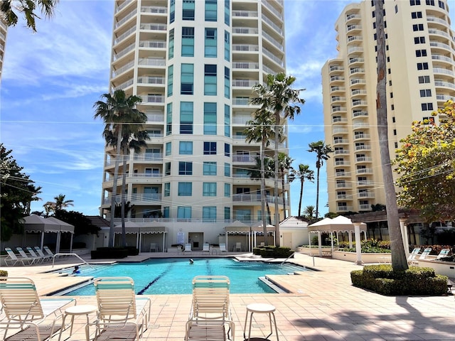 1180 Gulf Blvd Unit 306, Clearwater, FL 33767 - community pool with a patio area