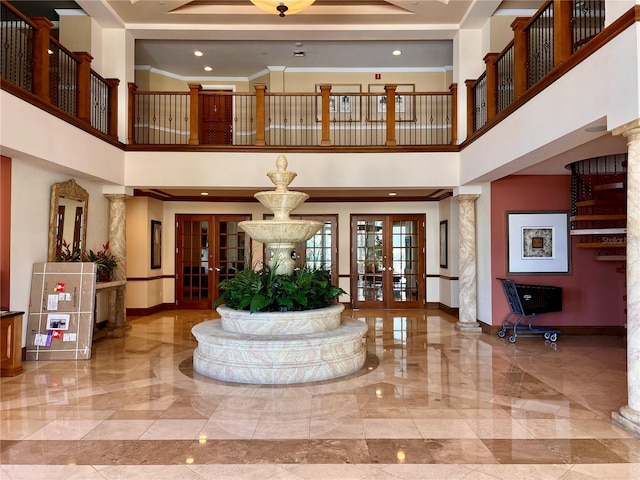 1180 Gulf Blvd Unit 306, Clearwater, FL 33767 - building lobby with a high ceiling and crown molding