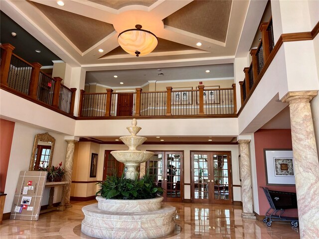 1180 Gulf Blvd Unit 306, Clearwater, FL 33767 - building lobby featuring a towering ceiling, recessed lighting, and coffered ceiling