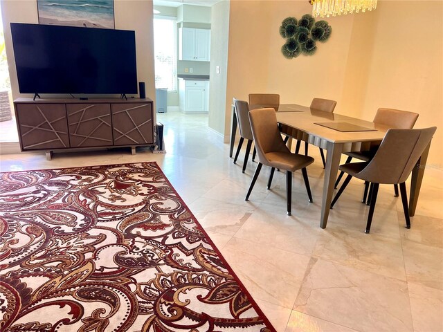 1180 Gulf Blvd Unit 306, Clearwater, FL 33767 - dining room featuring baseboards