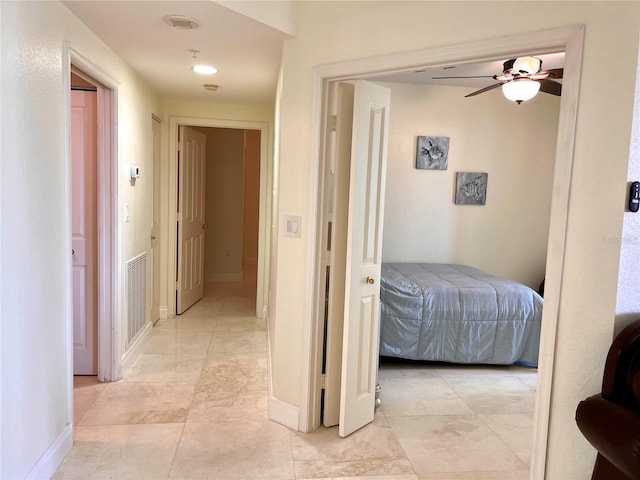 1180 Gulf Blvd Unit 306, Clearwater, FL 33767 - hall with baseboards and light tile patterned floors